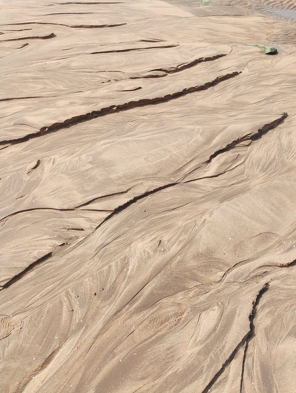 intricate sand patterns on casablanca beach